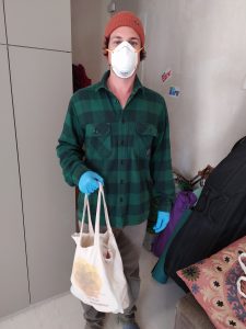 Mike Bilodeau in mask and glove to shop during pandemic