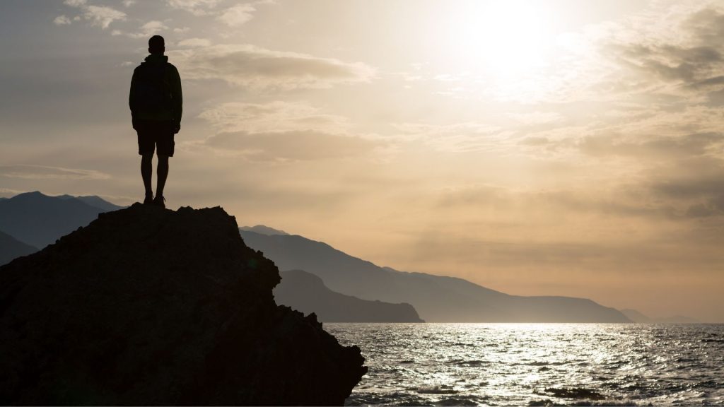 Man looking at the ocean on World Ocean Day