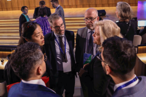 Negotiators exchanging points of view in between sessions at INC-2.